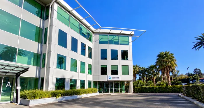 The Greenlane Medical Specialists clinic entrance at the far end of Building A, beneath the practice sign.